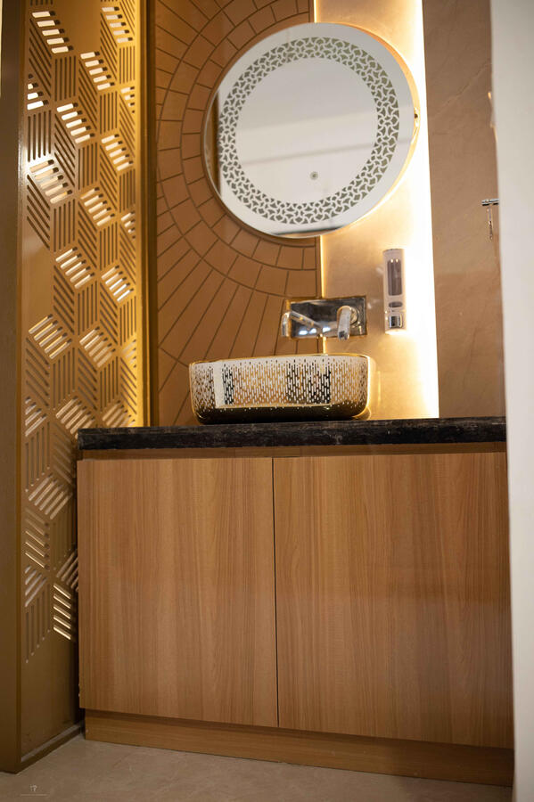 Vanity enhanced with subtle backlighting.
